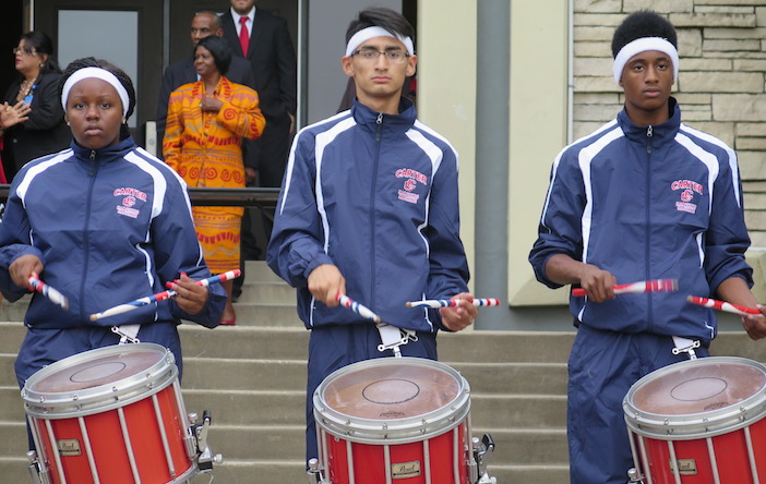 The David W. Carter High School Cowboys drumline entertained attendees at the ribbon cutting.
