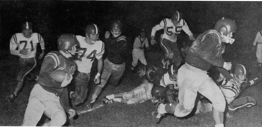 The first football game between Bryan Adams and Woodrow was in 1958.