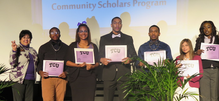 The scholarship recipients and a representative from TCU.