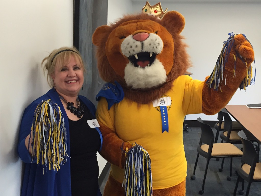 Trini Garza Principal Dr. Janice Lombardi and the Mountain View College mascot celebrate the school's Blue Ribbon award.