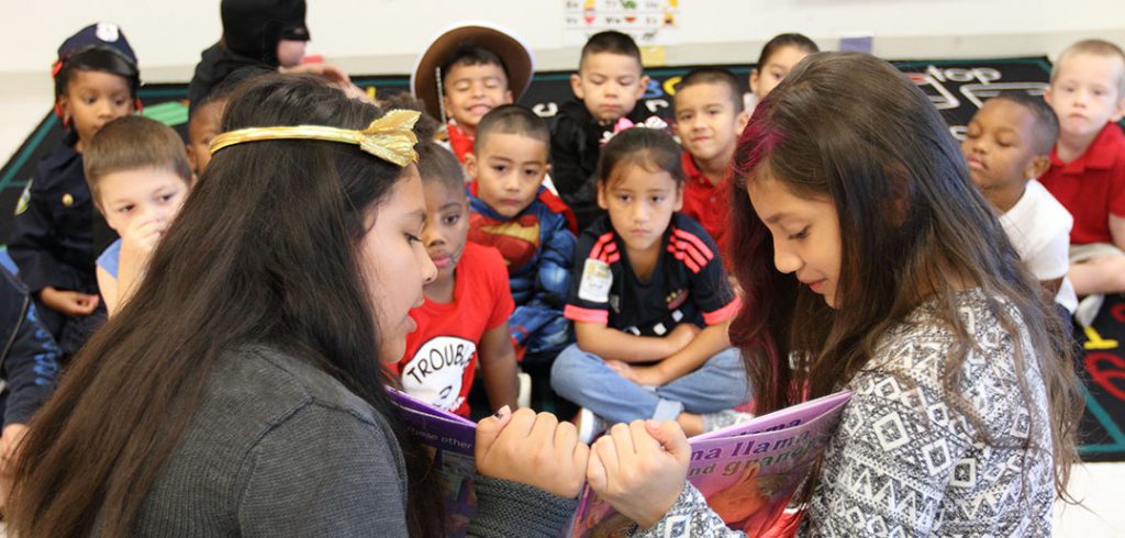 Halliday Elementary celebrates literacy with costumes, reading