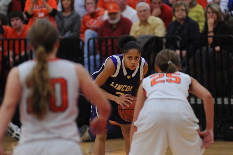 Cameasha Turner playing basketball at Lincoln High School.