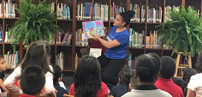 Olympic Gold Medalist promotes literacy among Pershing Elementary students
