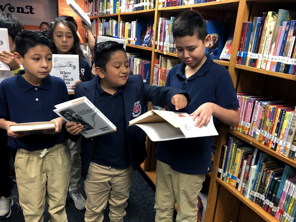 Whataburger donation stocks school library with over 1,000 books