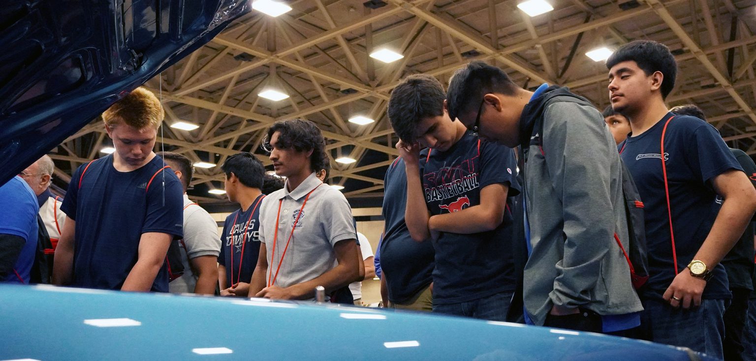 Automotive students find inspiration at Mecum Auctions car show
