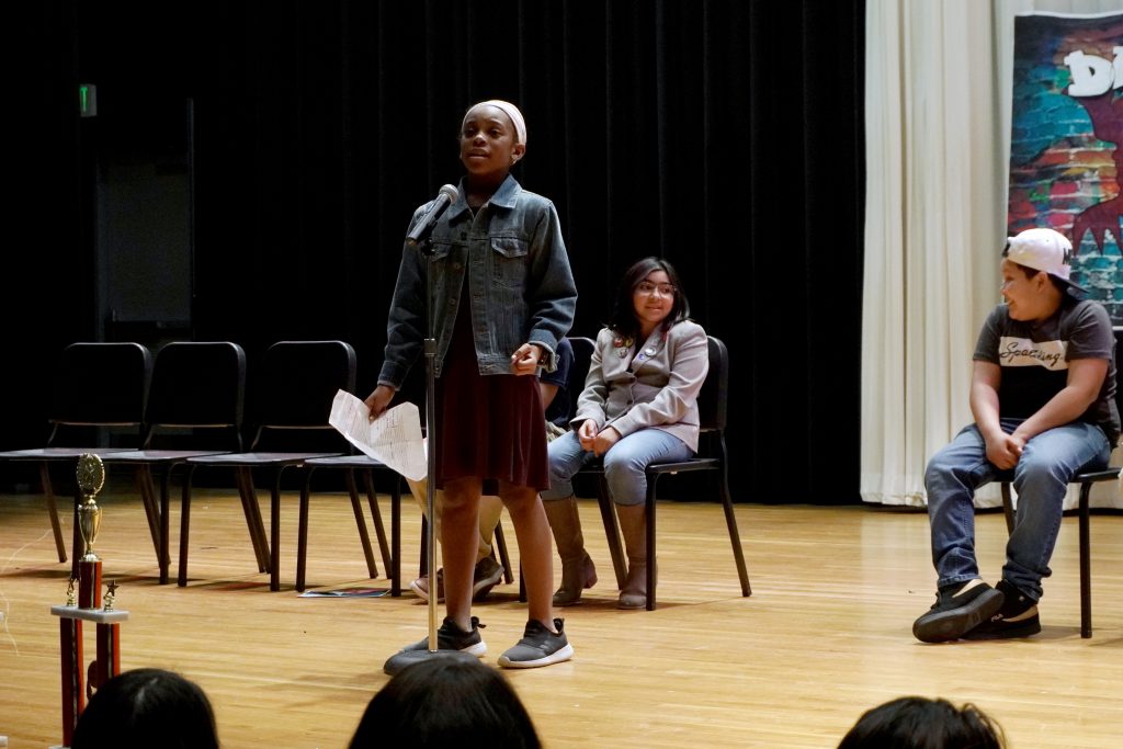 ‘We’ve created over 100 writers:’ Districtwide poetry slam inspires students to share their stories