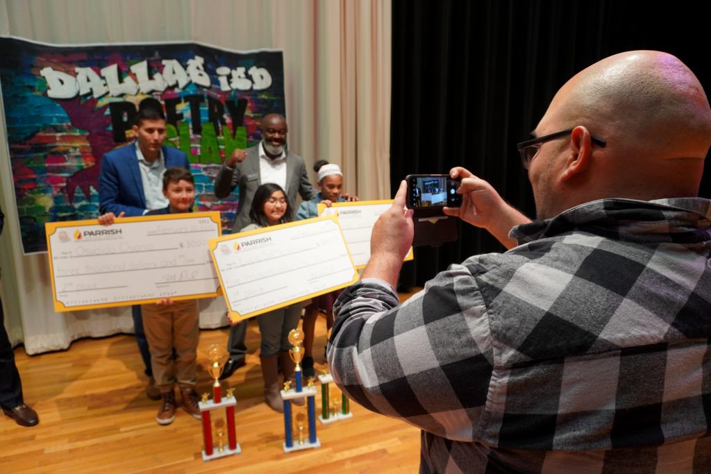 ‘We’ve created over 100 writers:’ Districtwide poetry slam inspires students to share their stories