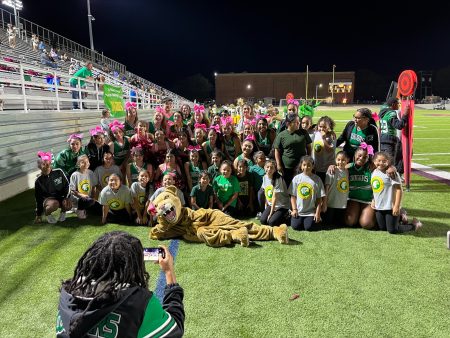 Elementary and high school cheerleaders unite at Feeder Pattern Nights